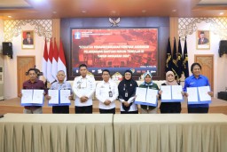 Kemenkumham Jatim Gelar Penandatanganan Kontrak Addendum dengan 34 OBH Terakreditasi